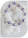 Bracelet perles de verre violettes et coupelles argentées .