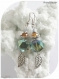 Boucles d'oreilles perles de verre transparentes reflets champagne et verts et cristal swarovski orange. crochets argentés.