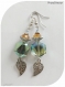 Boucles d'oreilles perles de verre transparentes reflets champagne et verts et cristal swarovski orange. crochets argentés.