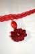 Collier ras de cou rouge médaillon fleur