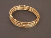 Fm006 bracelet total bronze sur fil mémoire
