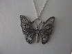 Collier long pendentif papillon et strass swarovski