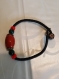 Bracelet cordon noir rigide avec perles