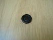 Cinqs boutons plastique noir forme ronde   26-17