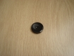 Trois boutons plastique noir à décor soleil   17-47