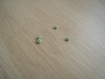 Lot de quatre perles vert pale   25-35