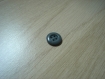 Deux boutons gris forme ronde avec creux   14-43