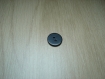 Quatre boutons creux plastique noir    26-85