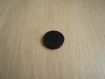 Trois boutons forme ronde noir en léger creux   17-58