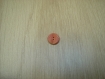 Bouton forme ronde rose ocre avec crant et creux 14-64