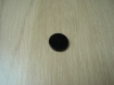 Trois boutons noir centre en creux  29-60