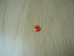 Petit bouton orange avec rebord  14-109