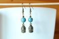 Boucles d'oreille perle jaspe bleu et tête de bouddha bronze