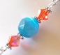 Collier perles facettes bleu, blanc, argenté/ cristal de swarovski orange/ pendentif hibou cabochon en verre et support métal argenté