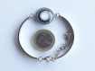 Bracelet semi-rigide en métal argenté, cabochon en verre bombé