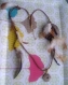 Collier country... plumes, cuir, bois, marbre...