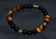 Bracelet h/f. onyx noir/oeil de tigre/perle toupie bronze