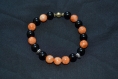 Bracelet pierres gemmes : calcite orange / onyx noir