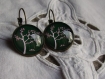 Boucles d'oreilles dormeuses  en metal couleur bronze  image sous dome en verre bombe 18mm collection arbre en noir et blanc
