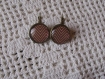 Boucles d'oreilles dormeuses   en metal couleur bronze  image sous dome en verre bombe 20 mm collection citrouille