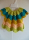 Gilet pétale bébé coloris multicolore au crochet