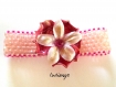 Bracelet manchette tissage de perle  au fil et a l'aiguille avec et fleur central en porcelaine froide 