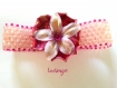 Bracelet manchette tissage de perle  au fil et a l'aiguille avec et fleur central en porcelaine froide 