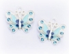 Lot de 2 breloques papillons en métal argenté émaillé et strass - coloris bleu