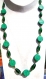 Collier constitué de perles rondes plates en pâte fimo, avec motif vert et petite touches bleues ciel.