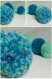 Peluche bébé chenille vert et bleu en laine acrylique - pompon 