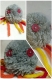 Peluche bébé pieuvre gris et multicolore en laine acrylique - pompon 