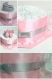Gâteau de couches 1 étage avec chaussons bébé rose et gris