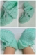 Chaussons bébé à revers et lacets vert émeraude en laine acrylique taille 3/6 mois - tricot