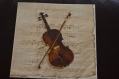 Très jolie serviette en papier violon et saxo