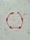 Bracelet en chainette dorée et  perles à facettes orange 