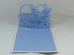 Carte ou faire-part l'envol en relief kirigami 3d couleur blanc, bleu lavande