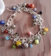 N°394 bracelet en métal argenté, avec des perles en verre millefiori