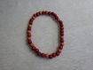 Bracelet perles en bois rose diamètre environs 6cm