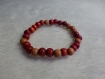 Bracelet perles en bois rose diamètre environs 5cm