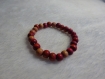 Bracelet perles en bois rose diamètre environs 4cm