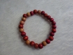 Bracelet perles en bois rose diamètre environs 4cm