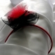 Serre-tête fleur noire et rouge en organza, plumes et perles