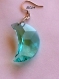 Boucles d'oreilles en cristal autrichien montées sur argent,croissant de lune vert clair facetté de 30 mm de hauteur et 15 mm de largeur,