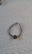 Br242- bracelet en cuir avec une perle en métal argenté
