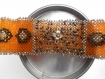 Bracelet orange tissé formes géométriques