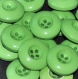 B63a3r / mercerie boutons plastique vert 22mm vendus à l'unité