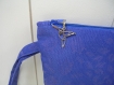 Pochette bleue et argent