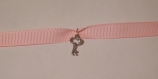 Bracelet rose avec sa clé 
