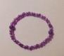 Bracelet aux perles violets
