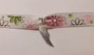 Bracelet motif fleur et son aile